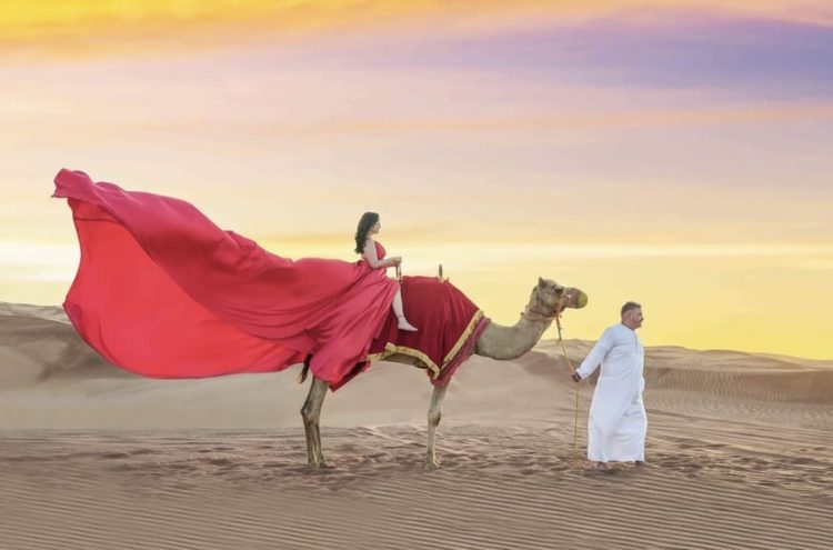 Capturing Elegance: Flying Dress Photoshoot in Dubai’s Majestic Desert