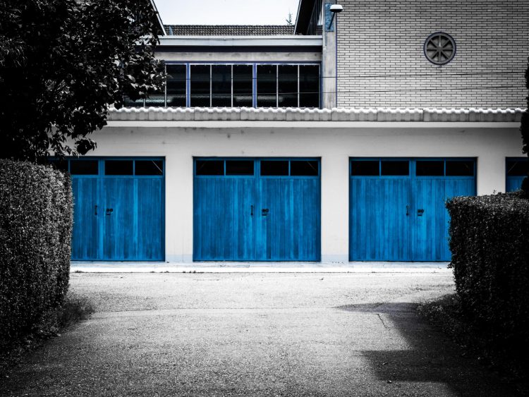 Enhancing Home Security and Functionality: The Importance of Garage Door Service