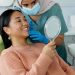 Tooth Implant vs. Dental Prosthesis: Which is Better After Extraction?